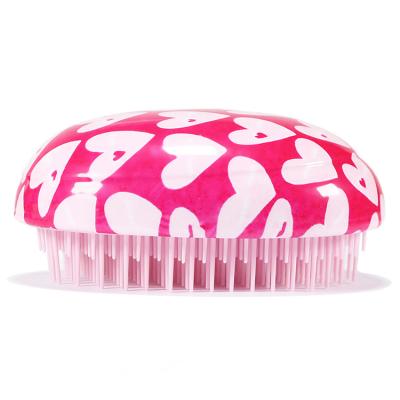 China Hot Selling ABS+TPEE Egg Comb Cute Portable Mini Light Massage Multi Function Comb With Customized for sale