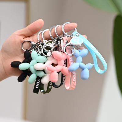 China Cute Dog Metal Silica Gel Cartoon Key Chain Logo Custom Creative 3D Key Chain Rubber Pendant for sale