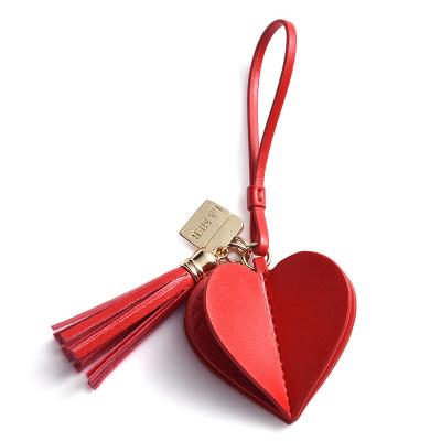 China The factory European ethnic heart-shaped leather tassels bag charm the keychains and American style wholesale heart-shaped bag pendants for sale