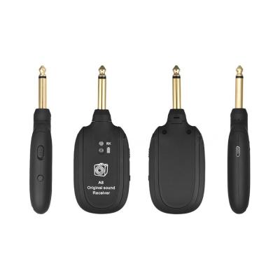 China Built-in Rechargeable UHF Guitar Wireless System Transmitter Receiver Guitar Recording Wireless Transmitter and UHF Transmitter for sale