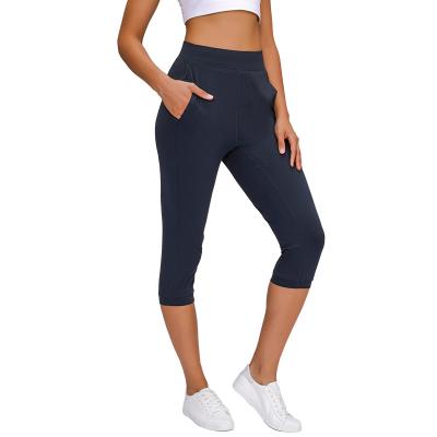 China Best Selling Naked Feeling Lift Women's Mid Rise Butt Workout Yoga Capris Breathable Leggings With Pockets for sale