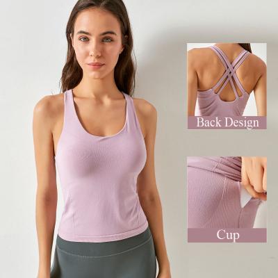 China Women Fitness Pad Strappy Cross Back Tank Top Sleeveless Stretchy Seamless Breathable Sportswear With Built In Bra for sale