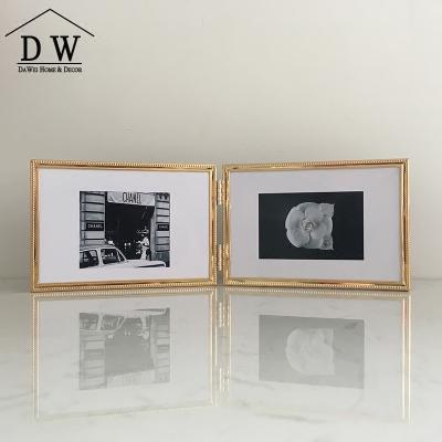 China New Design Europe\North America Double Sides Mounted Gold Metal Craft Handmade Creative Multi-size Folding Photo Frame for sale