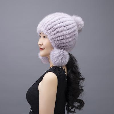 China Best Plush Winter Mink Fur Women Pom Poms Winter Hat With Earflap for sale