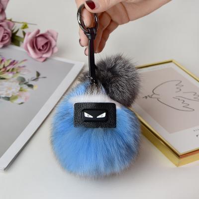 China Custom Women's Fox Fur Ball Luxury Loose Pompom Bag Metal Tassel Pom Pom Fur Ball Keychain For Handbag/Clothing/Car Key Pendant Key Holder for sale