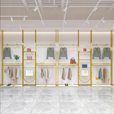 China Modern one-stop design women's clothing retail store display installation women's clothing store interior design ideas supplier for sale