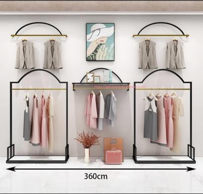 China Custom one-stop design women's clothing store decoration women's clothing store interior design clothing display racks furniture for sale