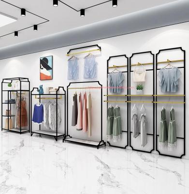 China Custom one-stop design men's clothing store interior design clothing display racks furniture men's clothing store decoration for sale