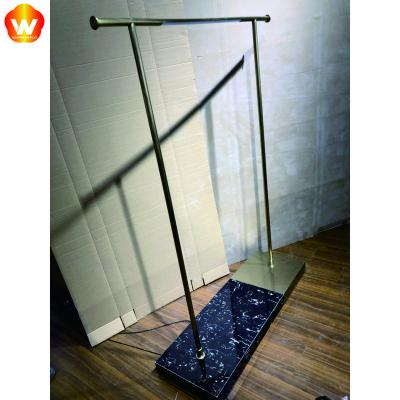 China For Garment Store Floor Display Rack Nakajima Heaven and Earth Display Table Rack NANWEI Customizable Curved Standing Props for sale