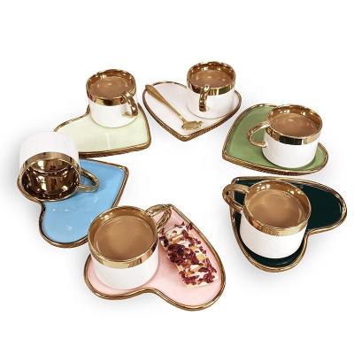 China Luster Design Heart Shape Porcelain Edge Coffee Tea Cup And Saucer Viable Colorful Gold Gift Set for sale