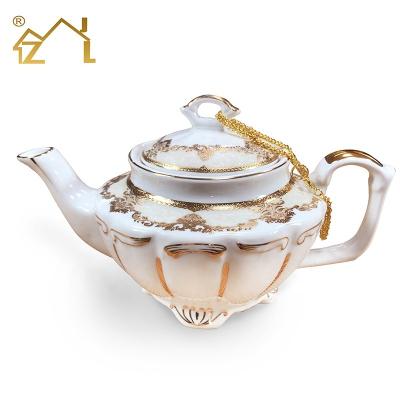 China Sustainable Luxury Golden Teapot Porcelain For Wedding for sale