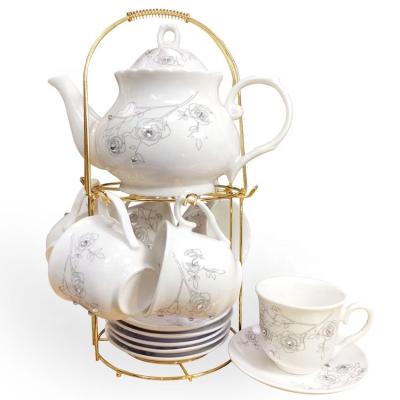 China Viable Wholesale New Design 13 Pcs Teapot Coffee Cup And Saucer Gift Set With Gold Stand for sale