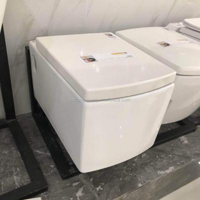 China Concealed Rimless Cistern DCBJ White Ceramic Double Wall Hung Toilet Price From Construction Company for sale