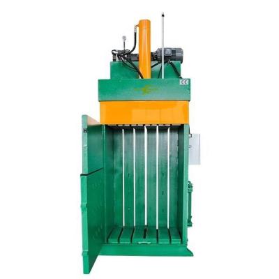 China Retail Vertical Paperboard Carton Waste Paper Baler Manual Control Hydraulic Baler for sale