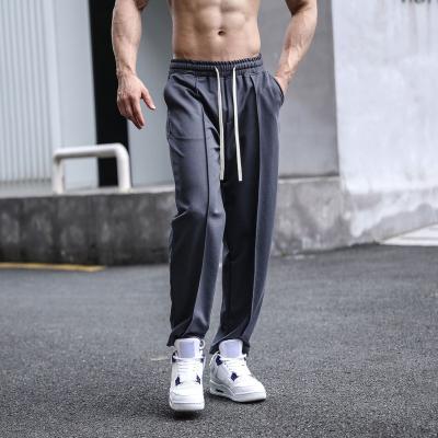 China Anti-wrinkle Fashion Sublimation Casual Wear Bottoms Comfortable Loose Baggy Straight Fit Trousers Custom Wide Leg Track Pants Men for sale