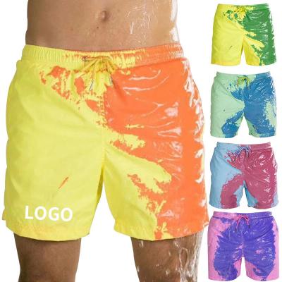 China QUICK DRY Custom Logo Board Shorts That change Color High Quality Water Reactive Dissolve Color Changing Swim Trunks Men for sale