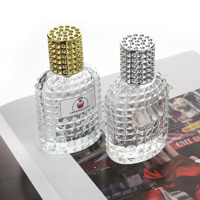 China 30ml 50ml Cosmetic Clear Glass Perfume Bottle With Gold Silver Spray Cap Glass Bottle Empty Refillable Perfume Atomizer Cosmetic Bottle for sale