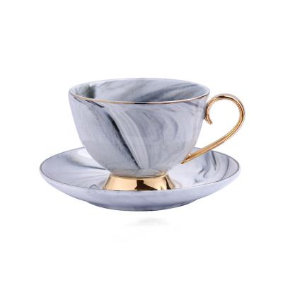 China Viable Custom Luxury Phnom Coffee Nordic Marbling Ceramic Cup And Saucer Set With Spoon Gold for sale