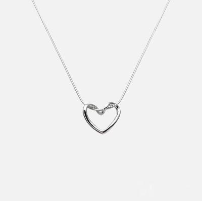 China Trendy simple style hollow titanium CIA necklace fashion jewelry steel heart shaped necklace for sale