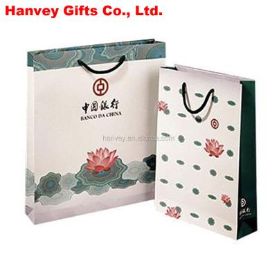 China Recyclable Factory price printed craft kraft paper bag, promotion gift cheap custom made brown paper shopping bag for sale