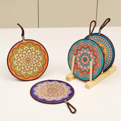 China Ceramic Tabletop Anti-scalding Mat Coaster With Cork Household Pot Tabletop Heat Resistant Sustainable European Tabletop Dinner Plate Trivet Mat for sale