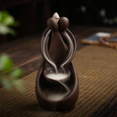 China Creative Chinese Backflow Censer Waterfall Smoke Incense Couples Hugging Incense Holder Censer Ceramic Crafts Decor Gift Home Ornaments for sale