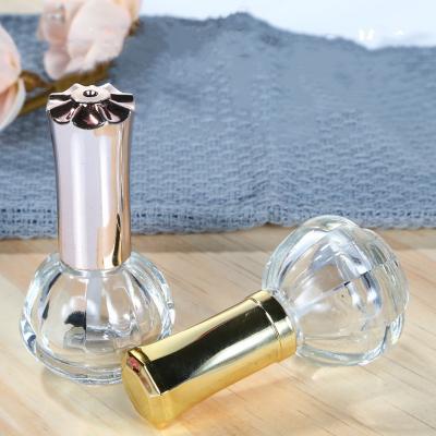 China Eco-friendly High End Empty Glass Nail Polish Lip Gloss Bottles Brush Rose Gold Screw Caps for sale