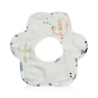 China Phthalate Free Soft Absorbent Cute Muslin Baby Saliva Handmade Round Bib Cotton With Belt Button for sale