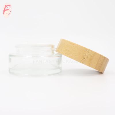 China Skin Care Cream 30ml 30g Customize Clear Transparent Glass Bamboo Cap Round Bamboo Jar Cosmetic Bamboo Cream Jar for sale