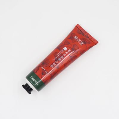 China Cosmetics 80ml Plastic Packaging Empty Tube Bright Red Tube For Beauty Peeling Mask With Octagon Cap for sale