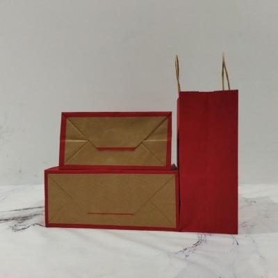 China Red Color Handmade Small Packaging Paper Bag Single Paper Handle Gift Bag for sale