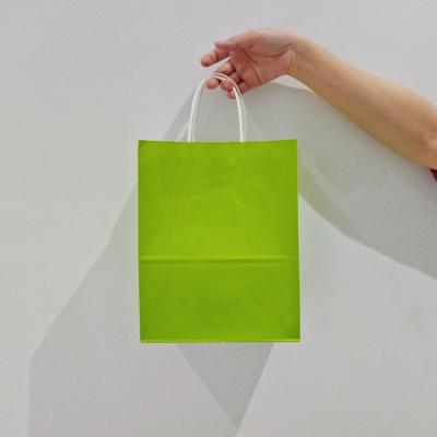 China Low Min Quantity Handmade Small Green Kraft Paper Bag Plain Handbag Gift Bag Green Paper Bag for sale