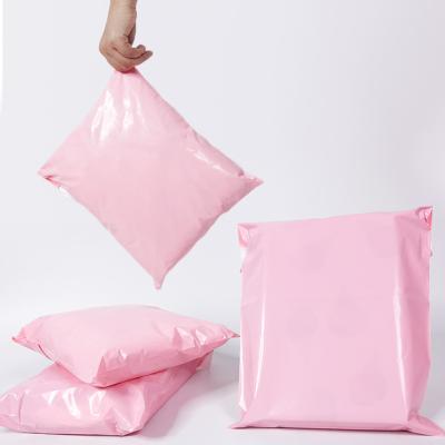 China Waterproof Hot Sale Warehouse Mailing Plastic Bags Durable Light Pink Express Bags Packing Clothes for sale