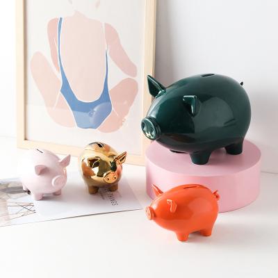 China Ceramic new ceramic piggy bank can only be filled with small change piggy bank for sale