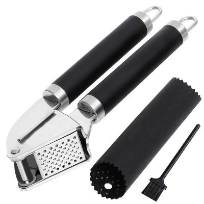 China Sustainable 304 Stainless Steel Garlic Press with Pickler and Peeler for sale