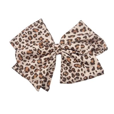 China Hair clips for women Daily easy to carry South Korea style big bow hairpin leopard print style popular women baby for sale