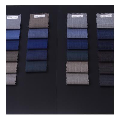 China Price wool polyester blend fabric organic tweed suitable fabric for suits / fashionable casual wear for sale