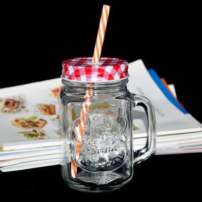 China 500ml Sustainable Iced Beverage Colored Glass Mason Jar With Straw Metal Lid for sale