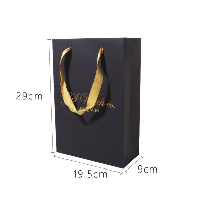 China New Design Recyclable Plain Black Shopping Paper Bag With Gold Hot Stamping Logo For Gift/Cosmetics/Clothes/Shoes/Skincare Set Packaging for sale