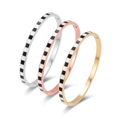 China New Design CLASSIC Vintage Black and White Checkboard Bracelets and Bangles for Women Enamel Charm Cuff Bangle Stainless Steel Jewelry for sale