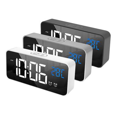 China Calendars LED Mirror Alarm Sound-activated Rechargeable Music Clock Bedside Dual Alarms With Nap Function for sale