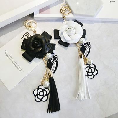 China FASHIONABLE Luxury Bag White Woman Plush Car Camellia Bags Black Key Chain Key Chain for sale