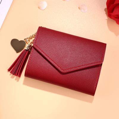 China Mini Wallets Korean Students Lovely Small Waterproof Purse Shorts Fashion Tassel Female Wallet For Women for sale