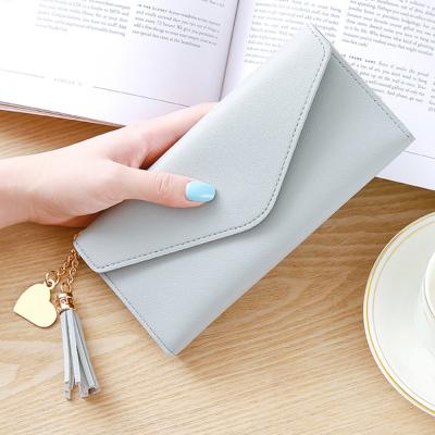 China PU Leather Female Wallet PU Clutch Money Bag Long Women Purse Tassel Coin Purses Waterproof Card Holder Wallets for sale