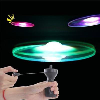 China Funny Spinning Flashing Flashing Flying Insect UFO LED Luminous Handle Light Toys For Kids Outdoor Game Color Random for sale