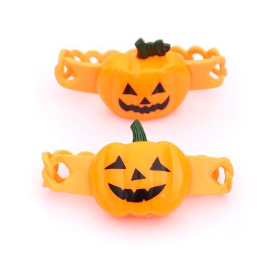 China Modern Luminous Halloween Wrist Strap Kids Props Pumpkin Lantern Brooch Kindergarten Flashing Gifts for sale