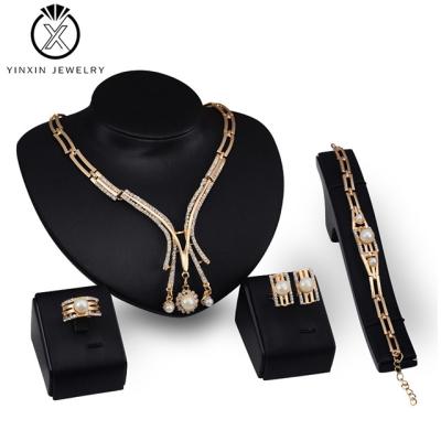 China YiXin CLASSIC jewelry European and American four-piece alloy set fashion jewelry set alloy shell pearl zircon bridal high-end jewelry for sale