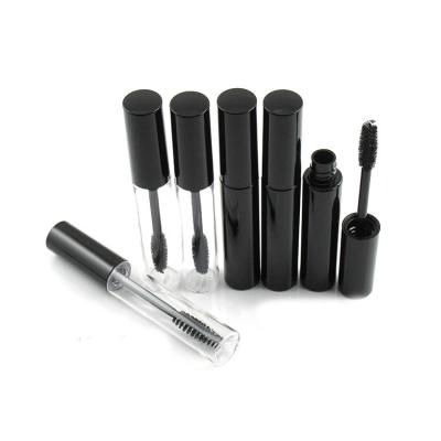 China Wholesale JIE MEI Stock Factory Wholesale 10ml Cosmetic Mascara Container Empty Round Glossy Black Mascara Tube With Iron Brush for sale