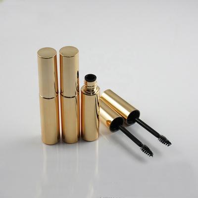 China Custom Logo Empty Plastic Eyelash Serum Tube from JIE MEI Stock MOQ 100PCS Gold 8ML Round Cosmetic Luxury Metallic Mascara Bottle With Brush for sale