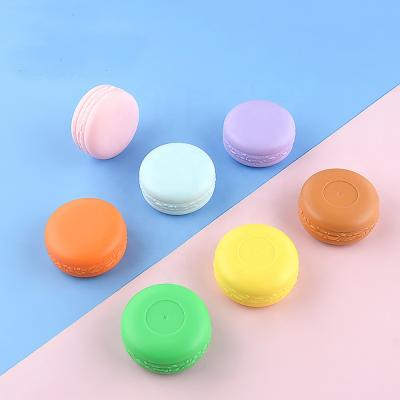 China JIE MEI Stock Low Cosmetic MOQ Macaron Shape Pink Blue Purpe Color Empty Lip Scrub Jar 5g 10g Plastic Face Eye Cream Container No Logo for sale